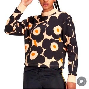 Adidas x Marimekko mock-turtleneck sweatshirt.